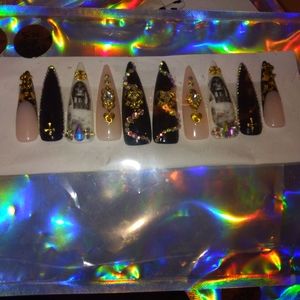 Beautiful blingy set of stiletto nails